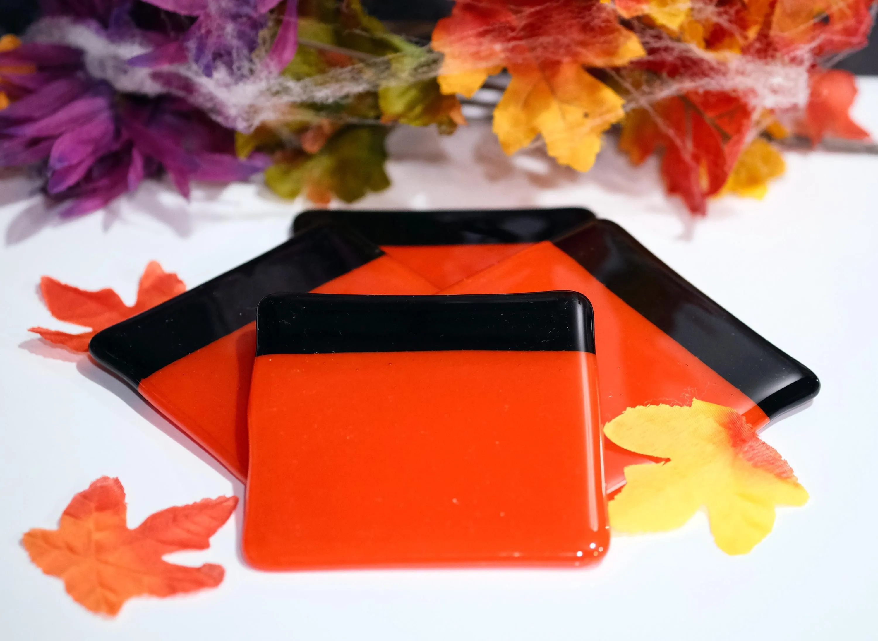 Vibrant reddish orange with black boarder fused glass drink coaster, set of 4, handmade, housewarming gift, home décor, halloween