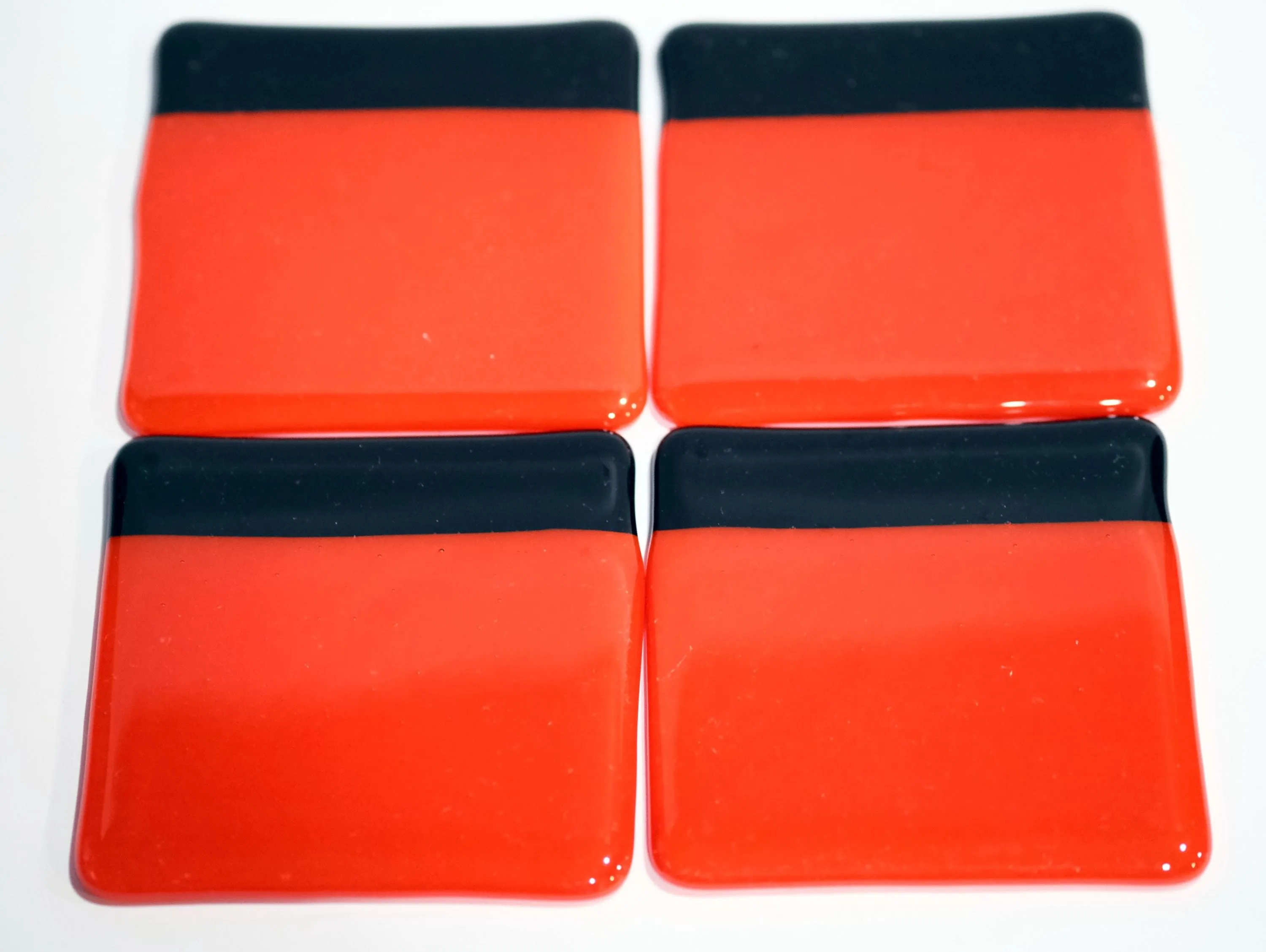 Vibrant reddish orange with black boarder fused glass drink coaster, set of 4, handmade, housewarming gift, home décor, halloween