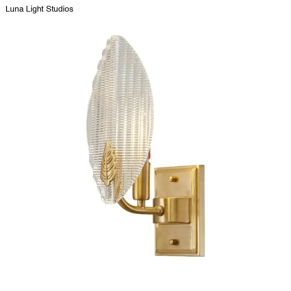 Vintage Brass Leaf-Shaped Wall Sconce Light with Clear Fluted Glass - Unique Wall Lighting Idea"