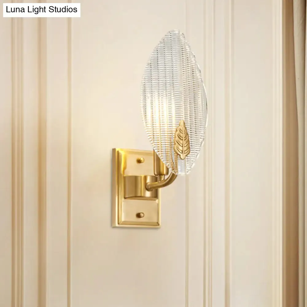 Vintage Brass Leaf-Shaped Wall Sconce Light with Clear Fluted Glass - Unique Wall Lighting Idea"